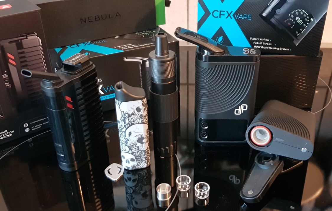 Portable vaporizers side by side — different heating methods, similar form factor